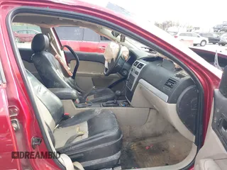 2006 Mercury Milan Premier z VIN 3MEHM08126R602958, wystawiony jako IAAI lot #41913459 z przebiegiem 168 229 mil mil oraz . Historia ofert i sprzedaży dostępna na DreamBid. Obrazek 5.