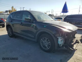 2017 Mazda CX-5 Touring with VIN JM3KFBCL0H0155725, listed as a Copart auction lot 47235715 with 49,840 mi miles and Salvage Title. Bid and sale history available at carsss.com. Image 4.