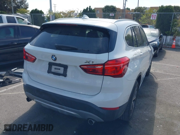 2018 BMW X1 xDrive28i with VIN WBXHT3C37J5K28375, listed as a IAAI auction lot 42039336 with 28,664 mi miles. Bid and sale history available at carsss.com. Image 4.