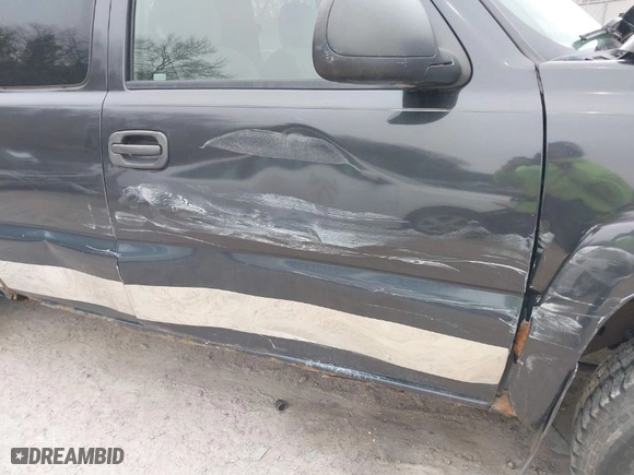 2003 Chevrolet Silverado 1500 LS with VIN 2GCEK19T131198891, listed as a IAAI auction lot 41984062 with 179,986 mi miles. Bid and sale history available at carsss.com. Image 12.