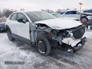 2021 Mazda CX-30 S with VIN 3MVDMBAL9MM221639, listed as a IAAI auction lot 41545920 with 57,239 mi miles and . Bid and sale history available at carsss.com. Image 1.