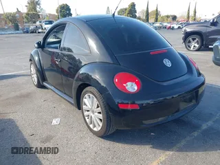 2008 Volkswagen New Beetle Coupe S with VIN 3VWRG31C08M500842, listed as a IAAI auction lot 41598559 with 19,611 mi miles. Bid and sale history available at carsss.com. Image 3.