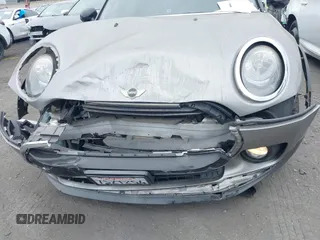 2016 MINI Clubman z VIN WMWLN5C56G2E30309, wystawiony jako IAAI lot #41772501 z przebiegiem 67 584 mil mil oraz . Historia ofert i sprzedaży dostępna na DreamBid. Obrazek 6.