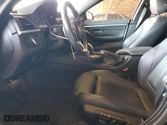 2015 BMW 4 Series 428i with VIN WBA4A9C54FGL86784, listed as a Copart auction lot 64073315 with 73,337 mi miles and Salvage title. Bid and sale history available at DreamBid. Image 7.