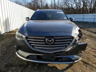 2020 Mazda CX-9 Grand Touring with VIN JM3TCBDY0L0412463, listed as a Copart auction lot 88532115 with 86,015 mi miles and Salvage Title. Bid and sale history available at DreamBid. Image 5.