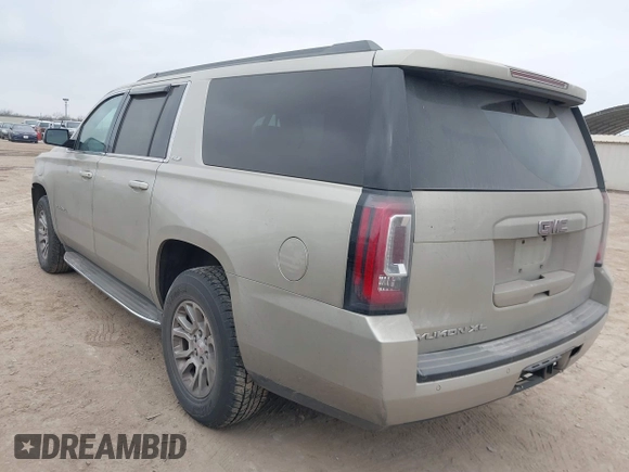 2015 GMC Yukon XL SLE z VIN 1GKS1GKC1FR155056, wystawiony jako IAAI lot #41517607 z przebiegiem 174 634 mil mil oraz . Historia ofert i sprzedaży dostępna na DreamBid. Obrazek 3.