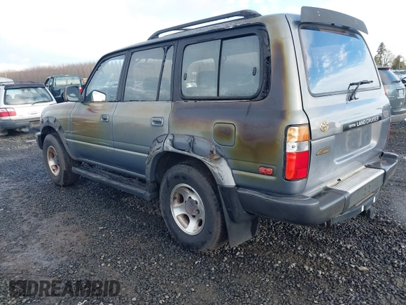 1995 Toyota Land Cruiser z VIN JT3DJ81W0S0094999, wystawiony jako IAAI lot #41583748 z przebiegiem 93 454 mil mil oraz . Historia ofert i sprzedaży dostępna na DreamBid. Obrazek 3.