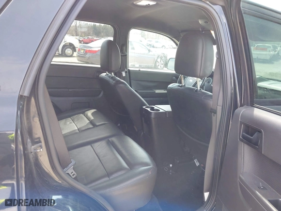 2009 Ford Escape XLT with VIN 1FMCU93GX9KC80750, listed as a IAAI auction lot 41953121 with 165,856 mi miles. Bid and sale history available at carsss.com. Image 8.