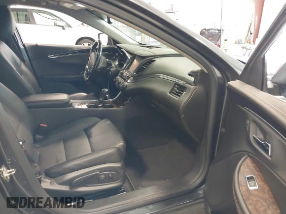 2014 Chevrolet Impala LT with VIN 1G1115SL4EU170716, listed as a IAAI auction lot 41905800 with 116,113 mi miles and . Bid and sale history available at DreamBid. Image 5.