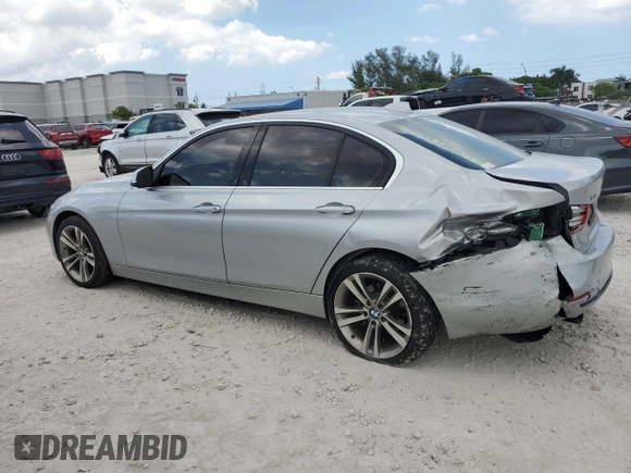 2018 BMW 3 Series 330i xDrive with VIN WBA8D9C50JEM33631, listed as a Copart auction lot 57595925 with 96,582 mi miles and Salvage title. Bid and sale history available at DreamBid. Image 2.