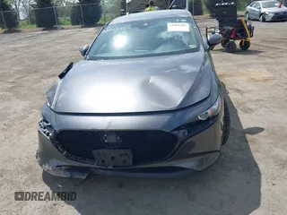 2023 Mazda 3 S Select with VIN JM1BPAKM3P1615785, listed as a IAAI auction lot 42064302 with 63,928 mi miles and . Bid and sale history available at DreamBid. Image 12.