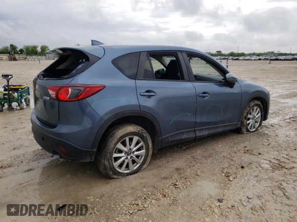 2016 Mazda CX-5 Touring with VIN JM3KE2CY4G0882671, listed as a Copart auction lot 51089555 with 50,951 mi miles and Salvage Title. Bid and sale history available at carsss.com. Image 3.