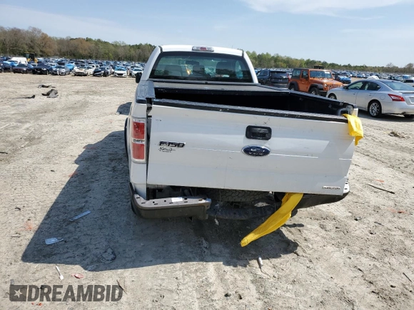 2013 Ford F-150 XL with VIN 1FTMF1CM8DKE67276, listed as a Copart auction lot 52690085 with 149,034 mi miles and Salvage title. Bid and sale history available at DreamBid. Image 6.
