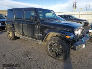 2023 Jeep Wrangler 4xe Sahara with VIN 1C4JJXP62PW516873, listed as a Copart auction lot 49481455 with 25,730 mi miles and Salvage Title. Bid and sale history available at carsss.com. Image 4.