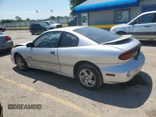 2001 Pontiac Sunfire SE z VIN 1G2JB124817315601, wystawiony jako Copart lot #63543704 z przebiegiem 147 535 mil mil oraz Szkody całkowita. Historia ofert i sprzedaży dostępna na DreamBid. Obrazek 2.