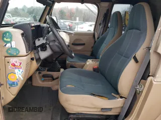 1999 Jeep Wrangler Sahara with VIN 1J4FY49S1XP409859, listed as a Copart auction lot 85006954 with 145,860 mi miles and Clean Title. Bid and sale history available at carsss.com. Image 7.
