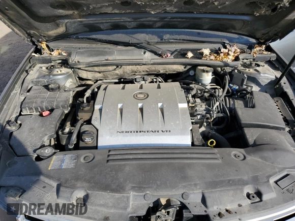 2009 Cadillac DTS 1SC z VIN 1G6KD57Y39U129722, wystawiony jako Copart lot #77071164 z przebiegiem 133 769 mil mil oraz Czysty tytuł • Clean title. Historia ofert i sprzedaży dostępna na DreamBid. Obrazek 11.