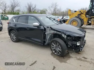2024 Mazda CX-5 2.5 Turbo Signature with VIN JM3KFBXY6R0401491, listed as a Copart auction lot 52446225 with 13,951 mi miles and Salvage Title. Bid and sale history available at carsss.com. Image 4.