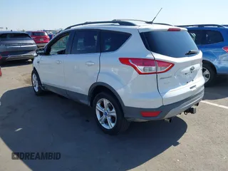 2013 Ford Escape SE with VIN 1FMCU0GX9DUB83638, listed as a IAAI auction lot 42471869 with 213,356 mi miles and . Bid and sale history available at DreamBid. Image 3.