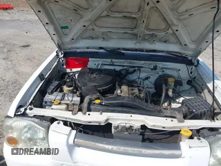 2002 Nissan Frontier XE with VIN 1N6DD26S82C369553, listed as a IAAI auction lot 42579202 with 392,819 mi miles and . Bid and sale history available at DreamBid. Image 10.