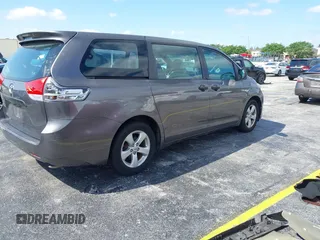 2012 Toyota Sienna with VIN 5TDZK3DC8CS190719, listed as a IAAI auction lot 41983695 with 68,377 mi miles and . Bid and sale history available at DreamBid. Image 4.