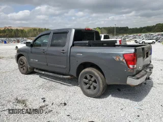 2010 Nissan Titan XE with VIN 1N6BA0EJ1AN312188, listed as a Copart auction lot 50984505 with 391,186 mi miles and Salvage Title. Bid and sale history available at carsss.com. Image 2.