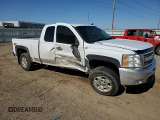 2012 Chevrolet Silverado 1500 LT with VIN 1GCRKSE7XCZ219549, listed as a Copart auction lot 51901435 with 214,051 mi miles and Salvage Title. Bid and sale history available at DreamBid. Image 4.