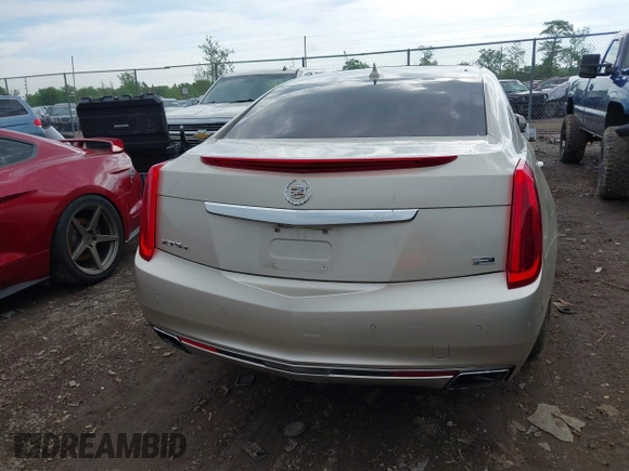 2014 Cadillac XTS Platinum z VIN 2G61T5S31E9209179, wystawiony jako IAAI lot #42241440 z przebiegiem 79 651 mil mil oraz . Historia ofert i sprzedaży dostępna na DreamBid. Obrazek 16.