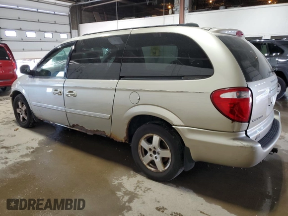2005 Dodge Caravan SXT with VIN 2D4GP44L65R438530, listed as a Copart auction lot 63415955 with 220,852 mi miles and Salvage title. Bid and sale history available at DreamBid. Image 2.