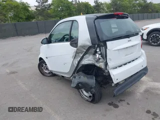 2013 Smart fortwo Pure with VIN WMEEJ3BA5DK625404, listed as a IAAI auction lot 42368884 with Not provided miles and . Bid and sale history available at DreamBid. Image 3.