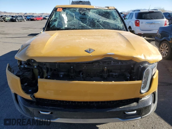 2022 Rivian R1T Launch Edition z VIN 7FCTGAAL2NN011755, wystawiony jako Copart lot #81940684 z przebiegiem Nie podano mil oraz Szkoda całkowita • Salvage title. Historia ofert i sprzedaży dostępna na DreamBid. Obrazek 5.