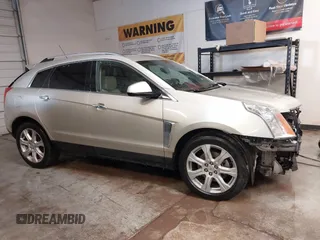 2015 Cadillac SRX Premium Collection with VIN 3GYFNDE32FS623153, listed as a IAAI auction lot 41577809 with 149,932 mi miles. Bid and sale history available at carsss.com. Image 14.