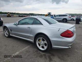 2005 Mercedes-Benz SL 500 with VIN WDBSK75F65F093215, listed as a Copart auction lot 63744135 with 94,645 mi miles and Salvage title. Bid and sale history available at DreamBid. Image 2.