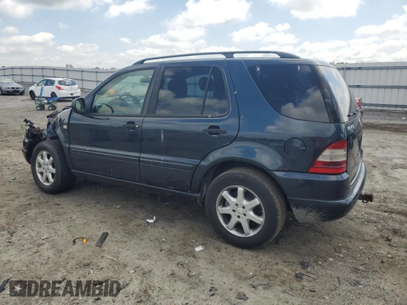 2000 Mercedes-Benz M 320/430/500 with VIN 4JGAB72E7YA168445, listed as a Copart auction lot 59401235 with 231,591 mi miles and Salvage title. Bid and sale history available at DreamBid. Image 2.