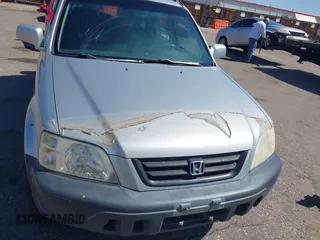 1999 Honda CR-V EX with VIN JHLRD1860XC056641, listed as a IAAI auction lot 42018329 with 321,707 mi miles. Bid and sale history available at carsss.com. Image 6.