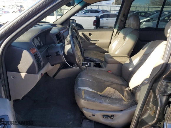 1999 Jeep Grand Cherokee Laredo with VIN 1J4GW58N9XC633464, listed as a Copart auction lot 84682454 with 212,738 mi miles and Salvage Title. Bid and sale history available at carsss.com. Image 7.