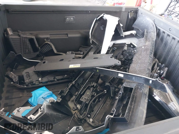 2025 Toyota Tacoma SR with VIN 3TMLB5JN7SM100983, listed as a IAAI auction lot 42220559 with 2,119 mi miles and . Bid and sale history available at DreamBid. Image 12.
