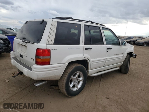 1998 Jeep Grand Cherokee Limited with VIN 1J4GZ88Z4WC164505, listed as a Copart auction lot 76843304 with 0 mi miles and Salvage Title. Bid and sale history available at carsss.com. Image 3.