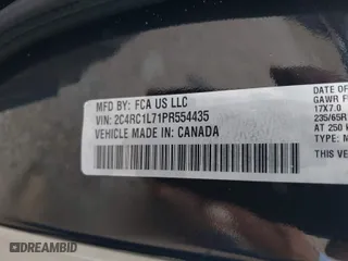 2023 Chrysler Pacifica Hybrid Touring L with VIN 2C4RC1L71PR554435, listed as a IAAI auction lot 41901500 with 53,373 mi miles. Bid and sale history available at carsss.com. Image 9.