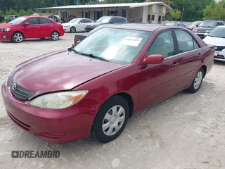 2002 Toyota Camry LE z VIN 4T1BE30K32U110304, wystawiony jako IAAI lot #42357455 z przebiegiem 221 389 mil mil oraz . Historia ofert i sprzedaży dostępna na DreamBid. Obrazek 17.
