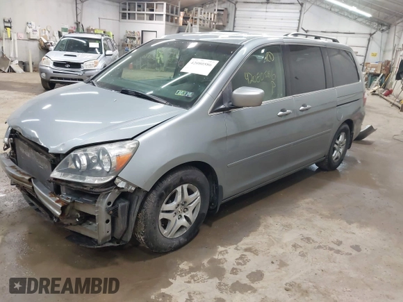 2006 Honda Odyssey EX with VIN 5FNRL38446B044231, listed as a IAAI auction lot 42080586 with 211,908 mi miles. Bid and sale history available at carsss.com. Image 2.