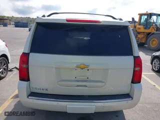 2015 Chevrolet Tahoe LTZ with VIN 1GNSCCKC4FR142856, listed as a IAAI auction lot 39886899 with 134,301 mi miles. Bid and sale history available at carsss.com. Image 16.