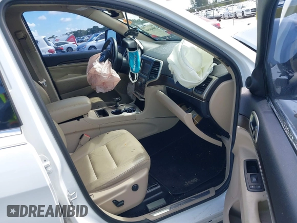 2014 Jeep Grand Cherokee Limited with VIN 1C4RJEBGXEC449252, listed as a IAAI auction lot 39946044 with 1 mi miles. Bid and sale history available at carsss.com. Image 5.