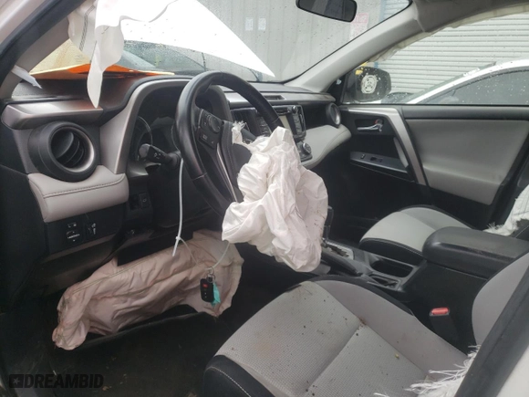 2016 Toyota RAV4 Hybrid XLE with VIN JTMRJREV7GD051091, listed as a Copart auction lot 73675162 with 168,832 mi miles. Bid and sale history available at carsss.com. Image 7.