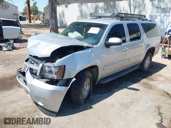 2013 Chevrolet Suburban LT with VIN 1GNSCJE06DR138925, listed as a IAAI auction lot 42008011 with 236,244 mi miles. Bid and sale history available at carsss.com. Image 2.
