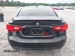 2018 Nissan Maxima Platinum z VIN 1N4AA6AP9JC392479, wystawiony jako IAAI lot #42209148 z przebiegiem 103 710 mil mil oraz . Historia ofert i sprzedaży dostępna na DreamBid. Obrazek 16.