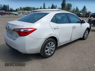 2016 Toyota Corolla L with VIN 2T1BURHE0GC525738, listed as a IAAI auction lot 42174966 with 122,208 mi miles and . Bid and sale history available at DreamBid. Image 4.