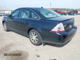 2008 Ford Taurus SEL with VIN 1FAHP24W48G131630, listed as a IAAI auction lot 42042813 with 86,855 mi miles. Bid and sale history available at carsss.com. Image 3.