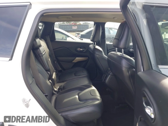 2018 Jeep Cherokee Limited z VIN 1C4PJLDB4JD568321, wystawiony jako IAAI lot #41429685 z przebiegiem 77 158 mil mil oraz . Historia ofert i sprzedaży dostępna na DreamBid. Obrazek 8.
