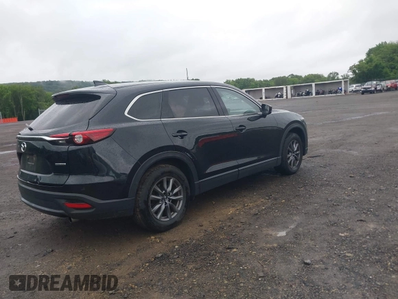 2020 Mazda CX-9 Touring with VIN JM3TCBCY5L0422262, listed as a IAAI auction lot 42456246 with 69,211 mi miles and . Bid and sale history available at DreamBid. Image 4.